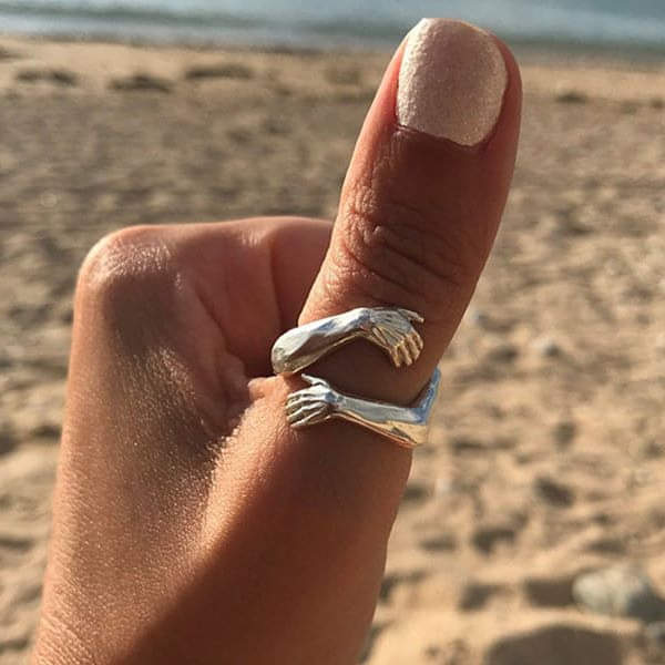 Kine™ | Sølvring med Klemende Hender